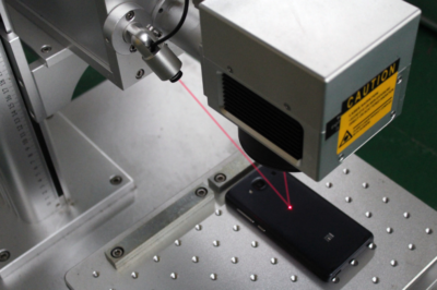 How does a laser machine marking system revolutionize industrial engraving and customization?